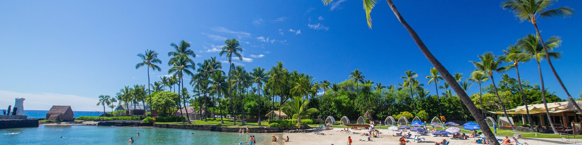 Kamakahonu Beach showing general coastal views, a beach and tropical scenes