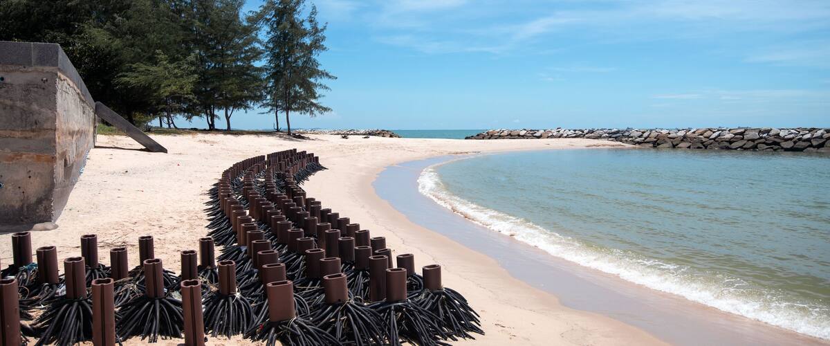 Reinforced artificial tree roots on beach (wave breaker blocks) along Hat Saeng Chan beach in Rayong, THAILAND