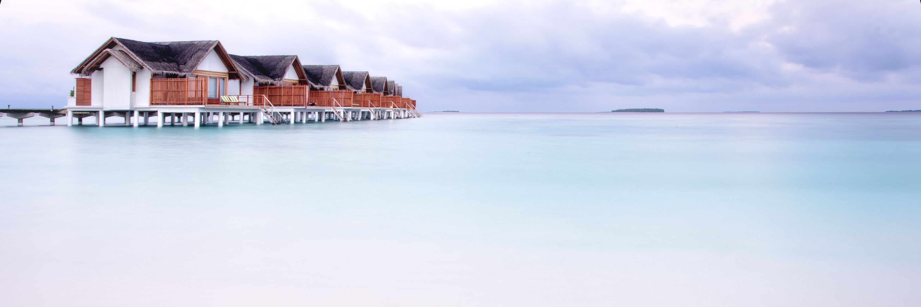 Maldives White Sand Beach Bungalows at Dawn