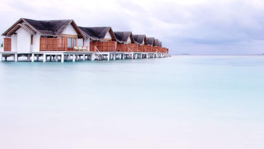 Maldives White Sand Beach Bungalows at Dawn