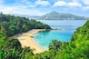 Picturesque view of Andaman sea in Phuket island, Thailand. View through the jungle on the beautiful bay and mountains. Tropical beach Laem Singh.
