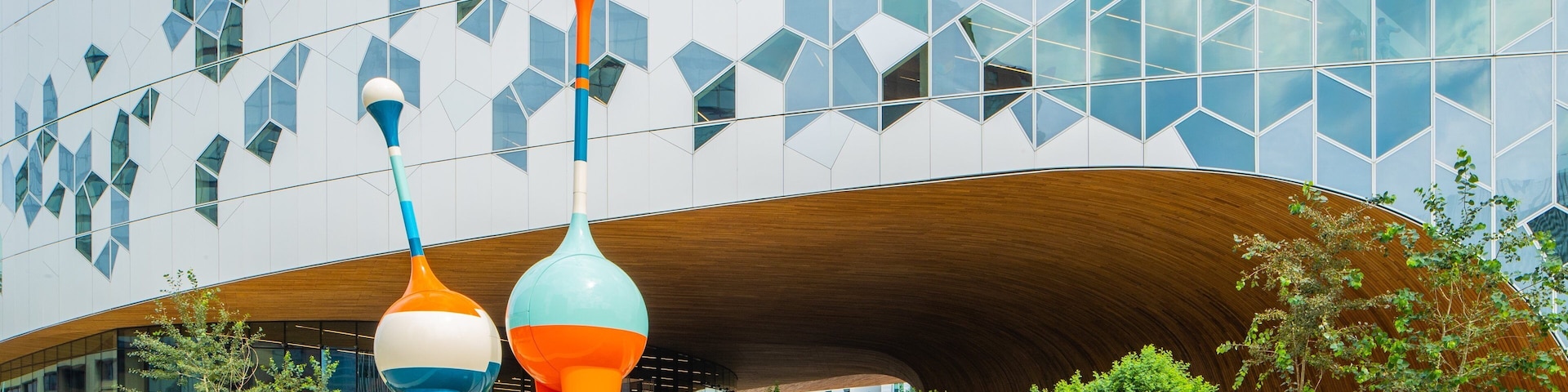 Calgary Central Library which includes modern architecture and outdoor art