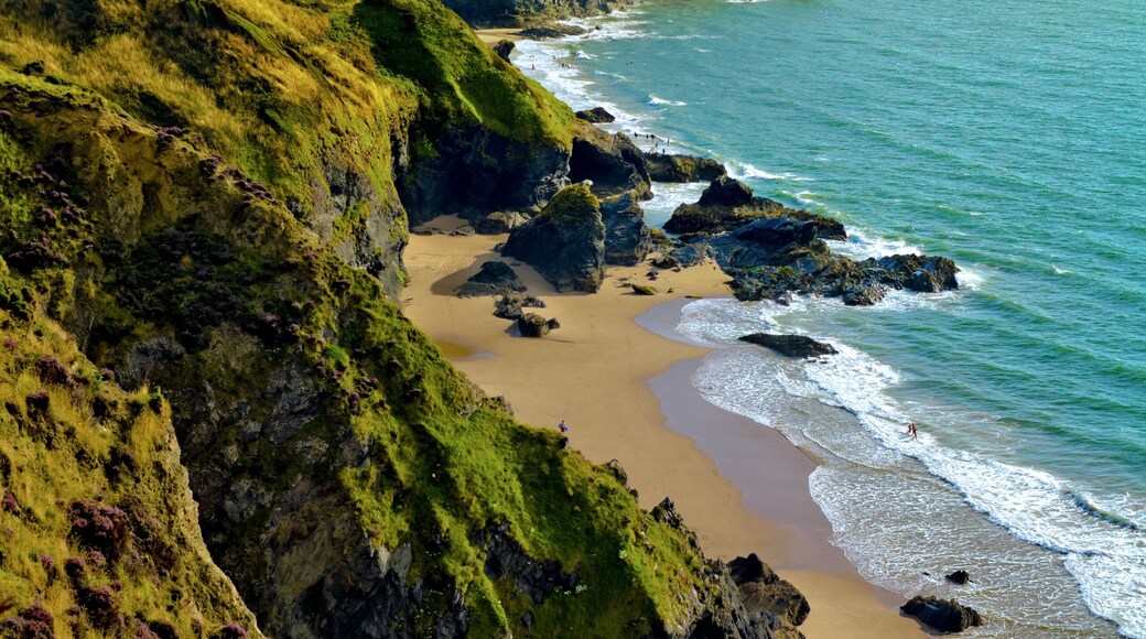 Looking along coastline towards Llangrannog village and beach in Pembrokeshire, Wales, UK