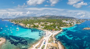 Aerial view with Cala Xinxell and Illetes, Mallorca haven for sun, sand, and sea, offering exclusive leisure in a picturesque setting.