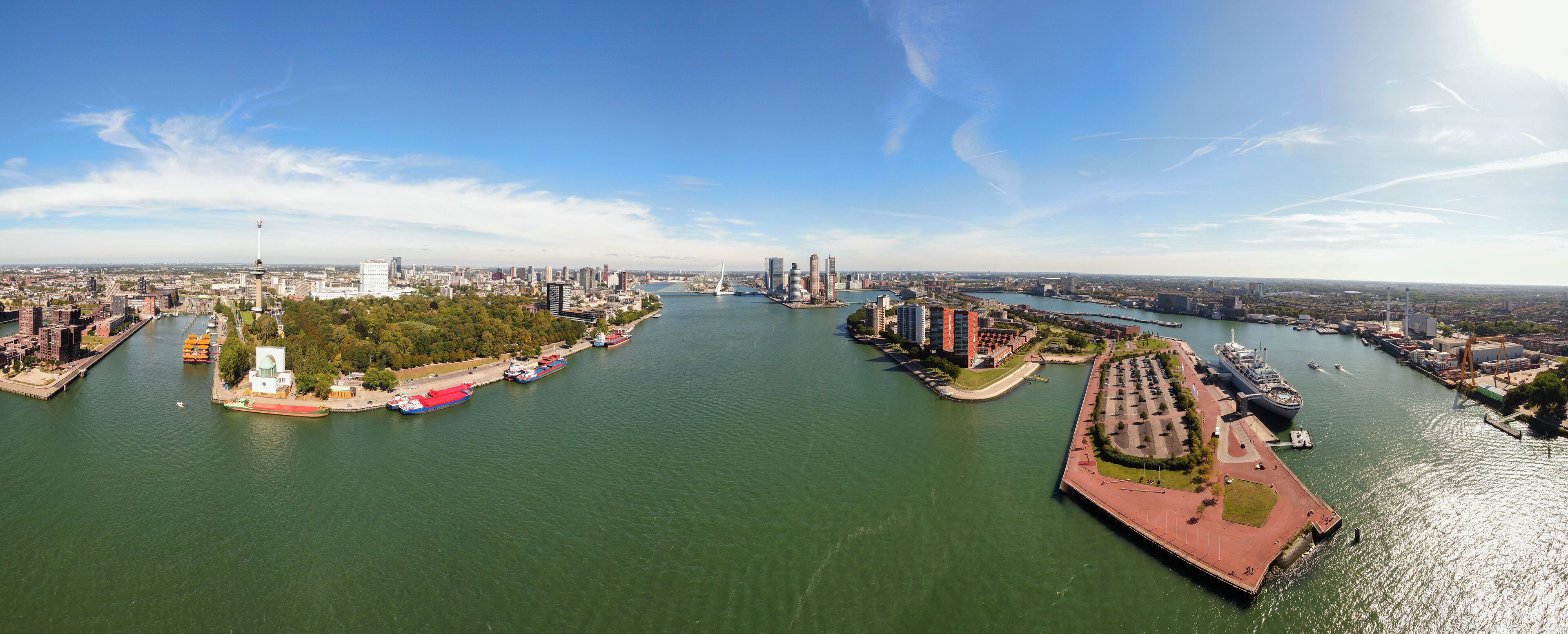 High resolution aerial panorama of Rotterdam with harbour and skyline of modern residential towers, euromast and Erasmus bridge 
