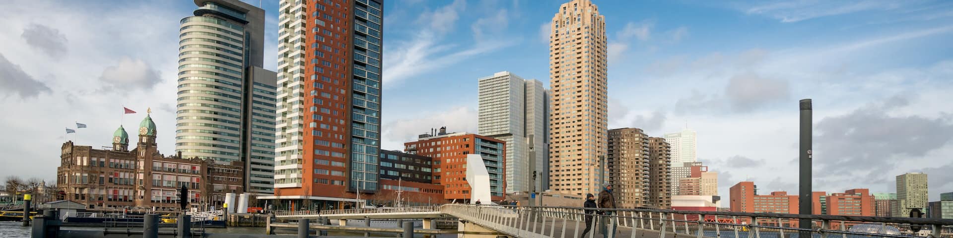Walking the Bridge from Katendrecht. Scenic Urban Stroll with Views of Rotterdam’s Skyline and Modern Architecture