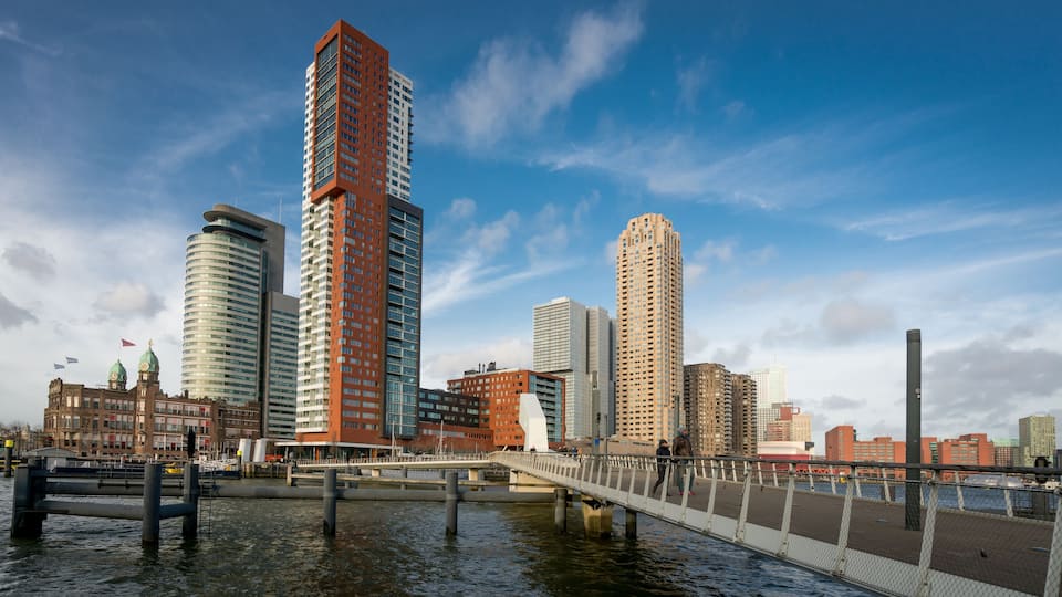 Walking the Bridge from Katendrecht. Scenic Urban Stroll with Views of Rotterdam’s Skyline and Modern Architecture