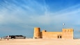 Al Zubarah Archaeological Site showing a castle and heritage architecture