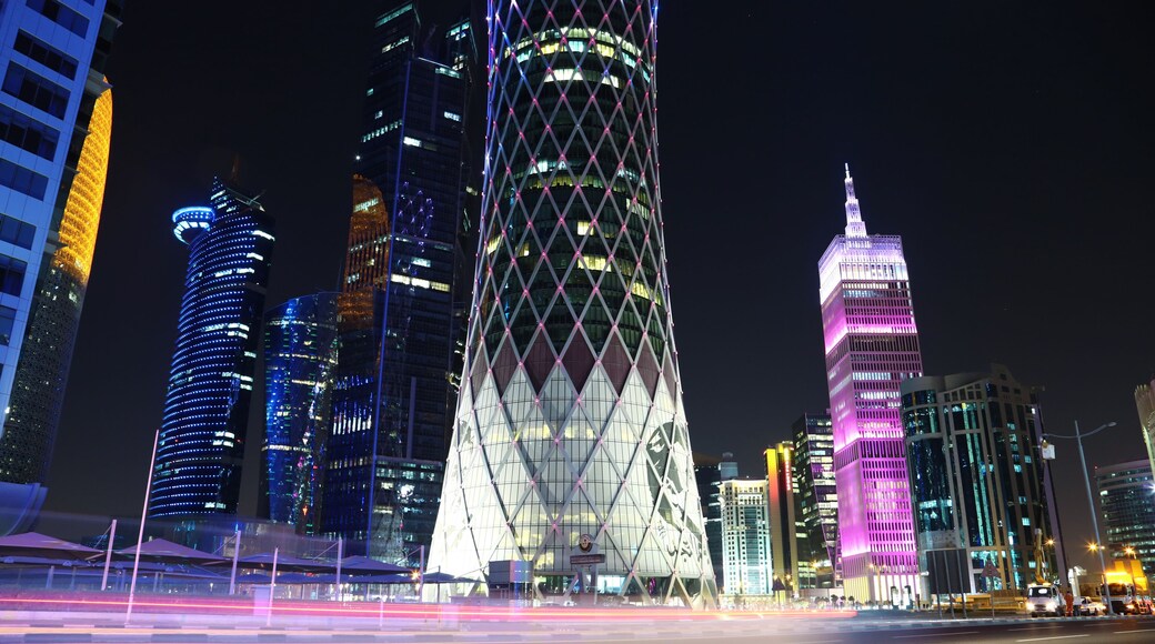 Night road traffic in financial centre in Doha, Qatar