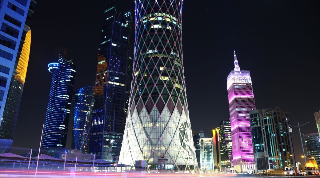 Night road traffic in financial centre in Doha, Qatar