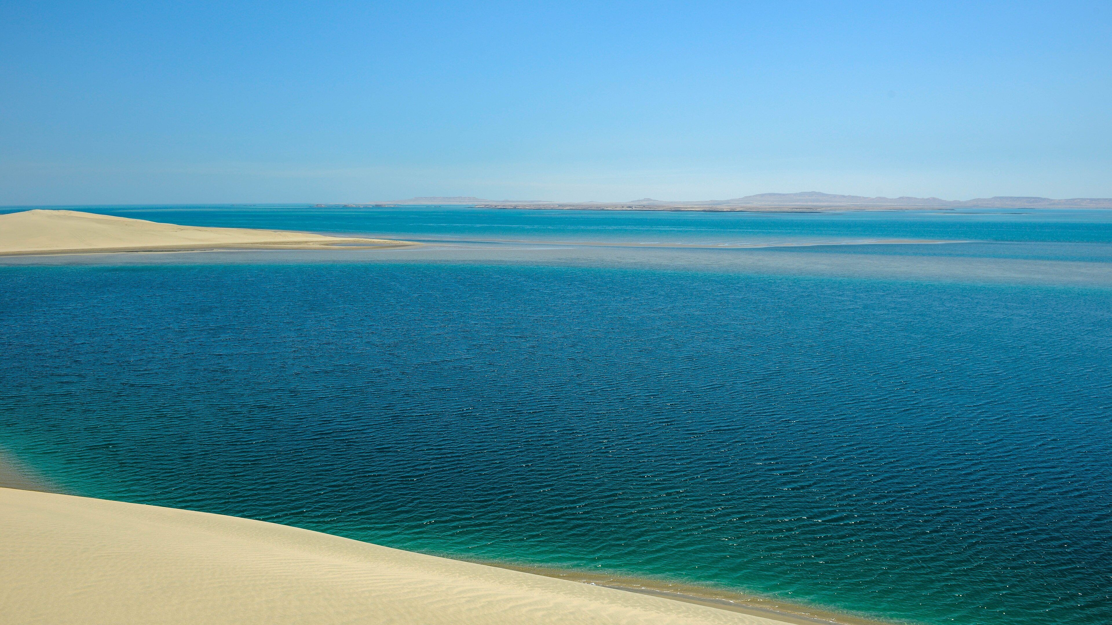 Khor Al Udeid Beach showing general coastal views and a beach