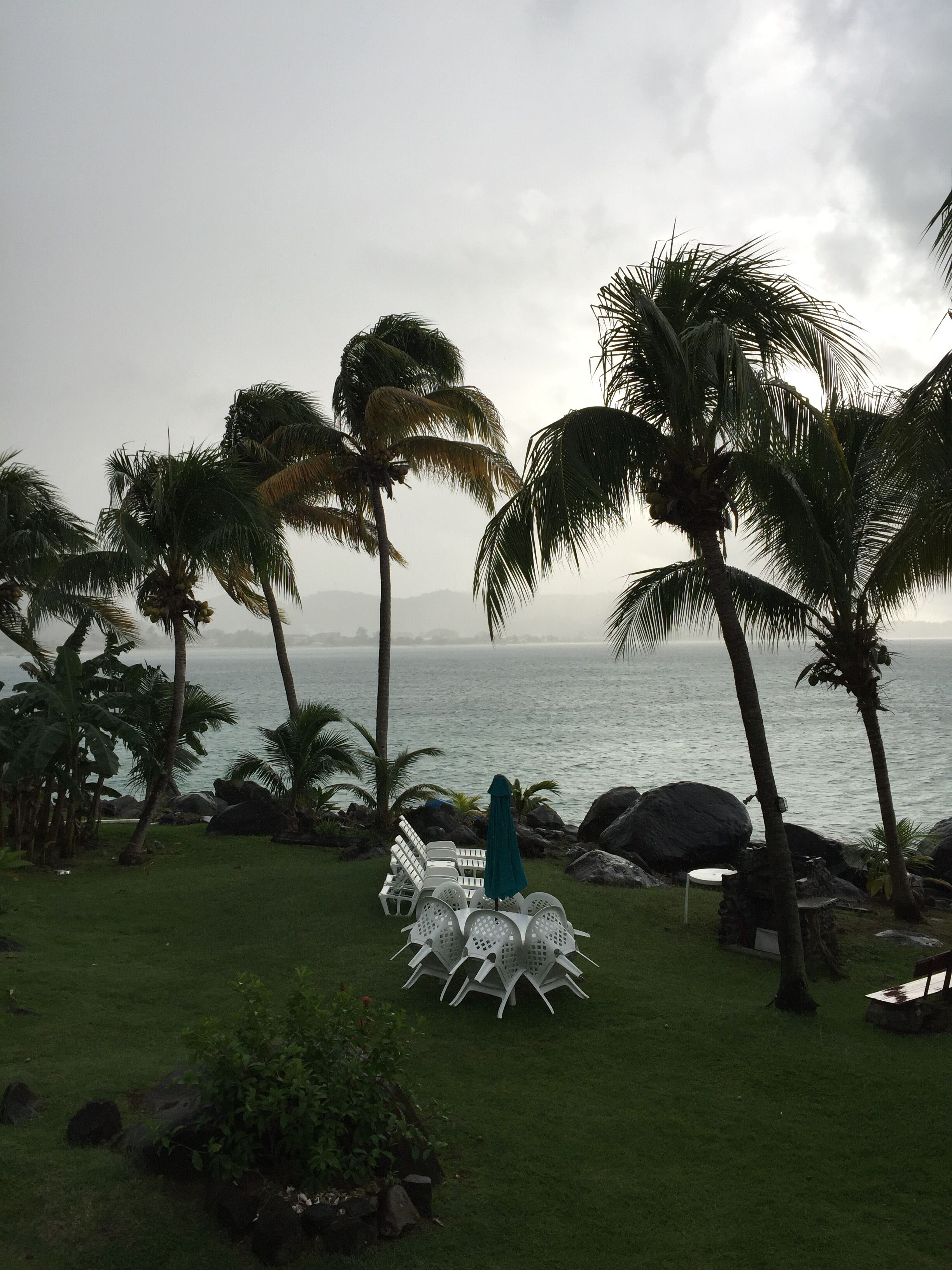 View of Grand Anse Beach in the distance, in the rain.