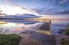 Summer At The Lake. Beautiful sunset reflected in the clean waters of Indian Lake State Park in the Upper Peninsula of Michigan.
