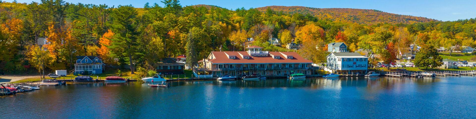 Alton Bay at Lake Winnipesaukee aerial view on Harmony Park and village of Alton Bay in fall in town of Alton, New Hampshire NH, USA.