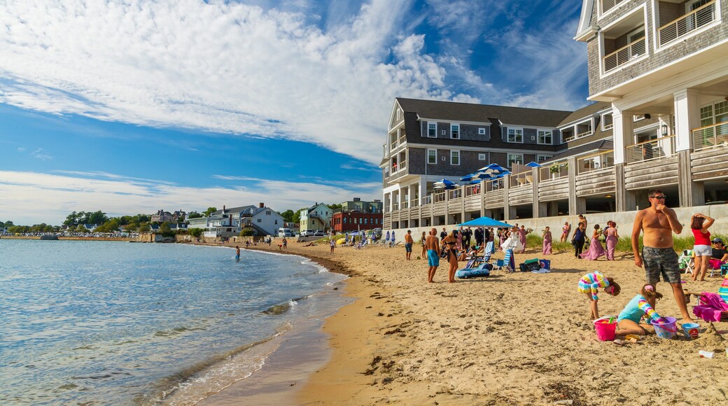 Pavilion Beach which includes a coastal town and a sandy beach