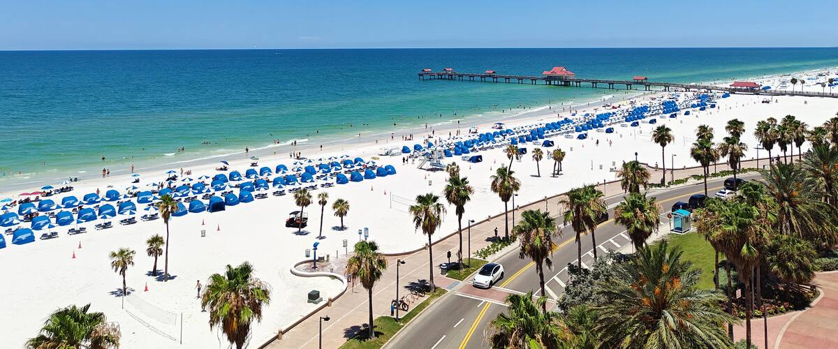 View of Clearwater beach with umbrellas and chairs. Florida, USA.