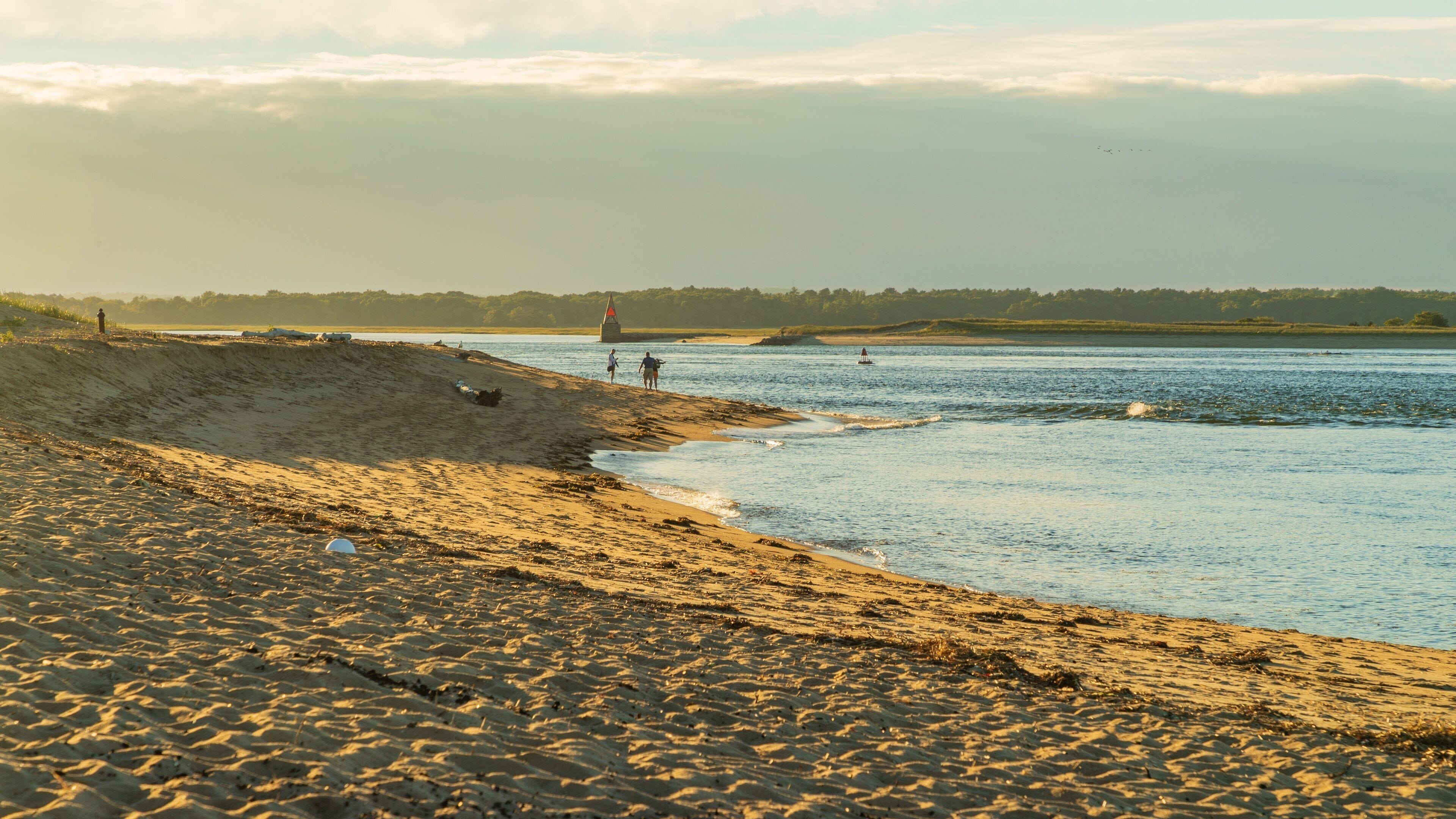 Plum Island Beach showing general coastal views, a sunset and a beach