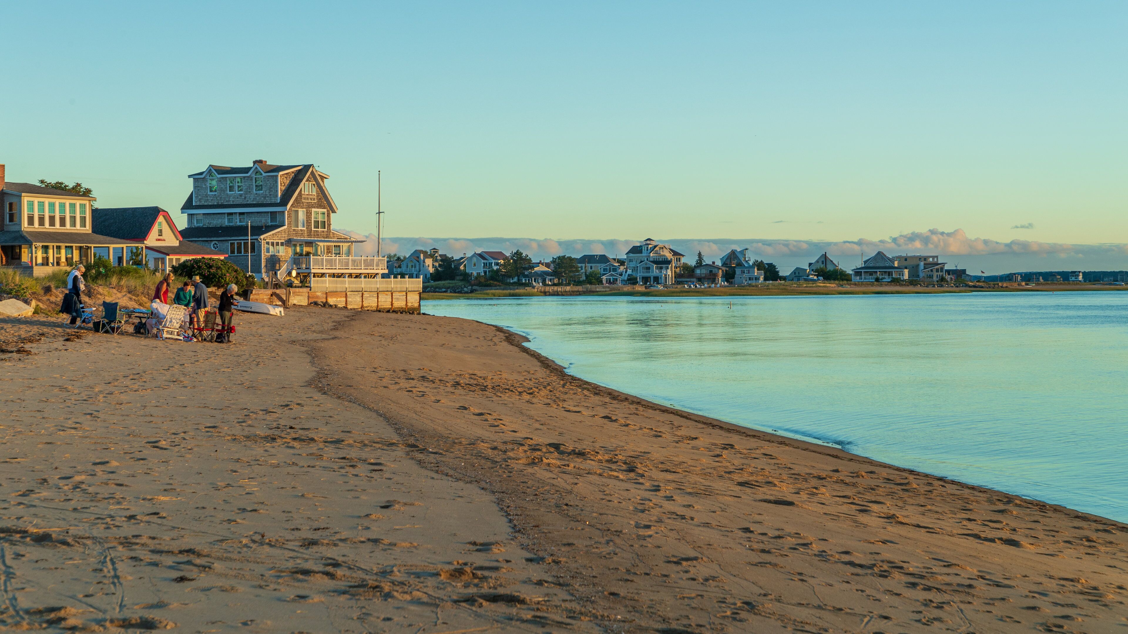 Plum Island Beach showing a sandy beach, a sunset and general coastal views