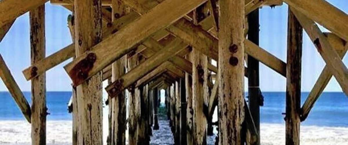 You can walk for miles and not see another person! This is an old pier that has largely been abandoned after a storm took out part of it. #Festival