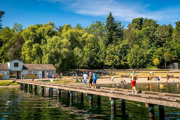 Mount Baker Beach showing a lake or waterhole as well as a small group of people