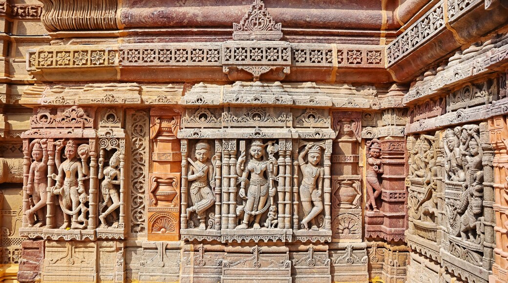 Carved panel of Hindu deities on Hatkeshwar Temple, Vadnagar, Mehsana, Gujarat, India.