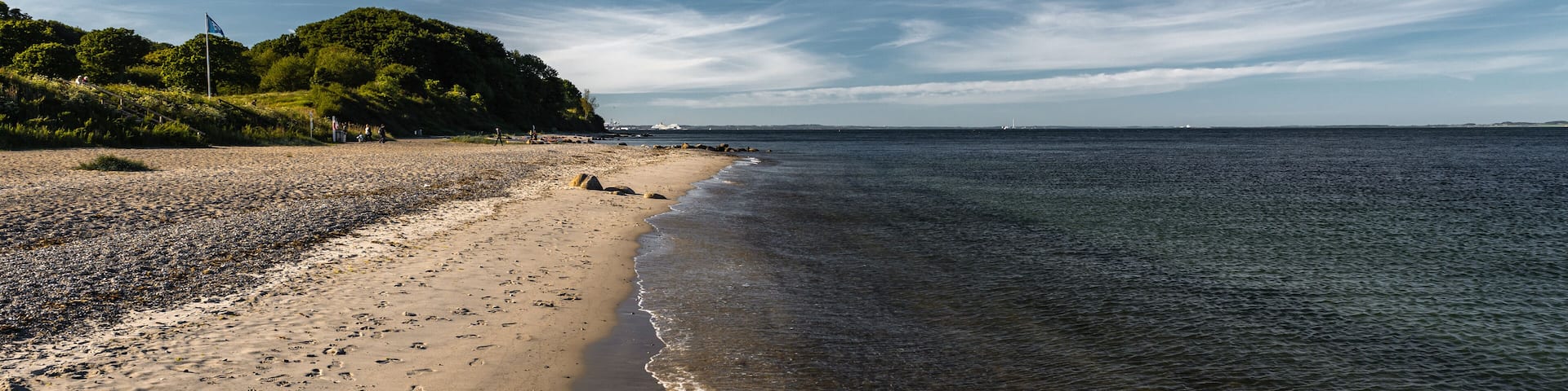 Danish coast near Aarhus with beautiful sky, beach and sea