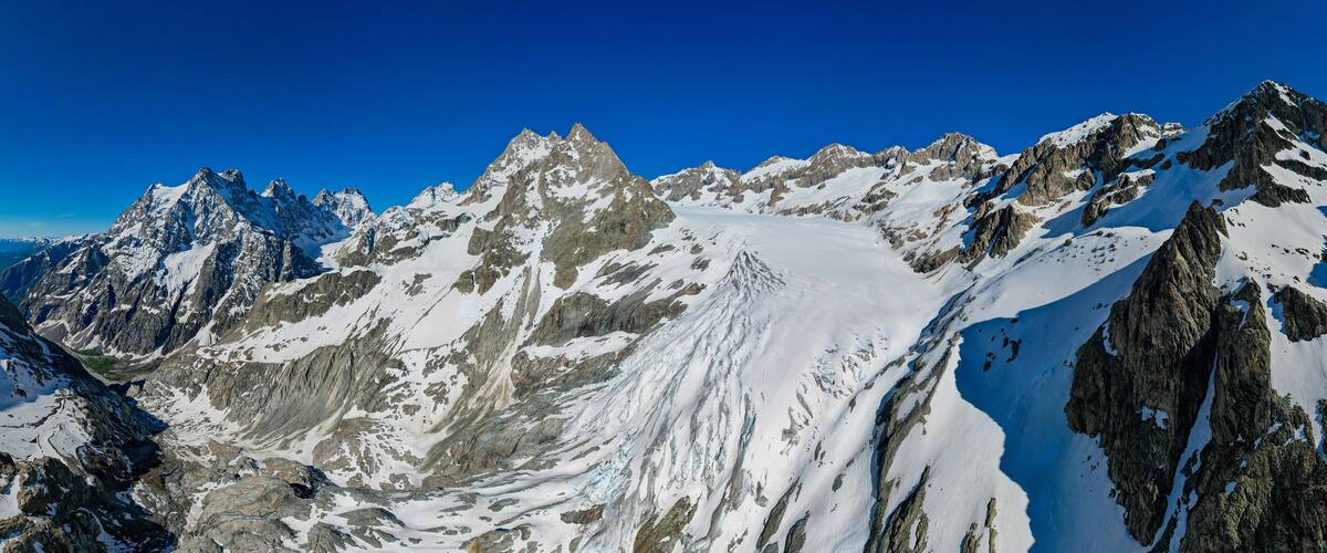 Aerial view of The Glacier Blanc in the Ecrins Mountains France Melting during Springtime - Most Beautiful French Alps Mountains