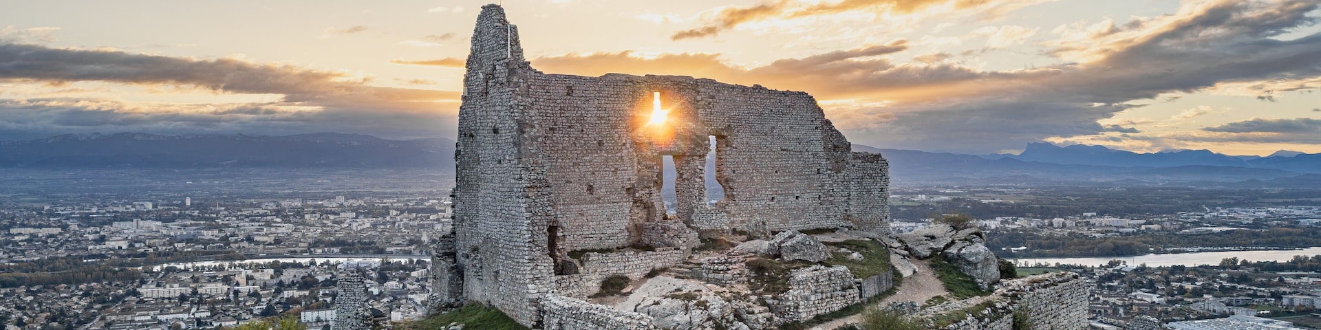 Ruins of Château de Crussol, a 12th Century Medieval Castle on a Hilltop Overlooking the Rhône Valley in Saint-Péray, Ardèche, Opposite Valence, France – Aerial Scenic View