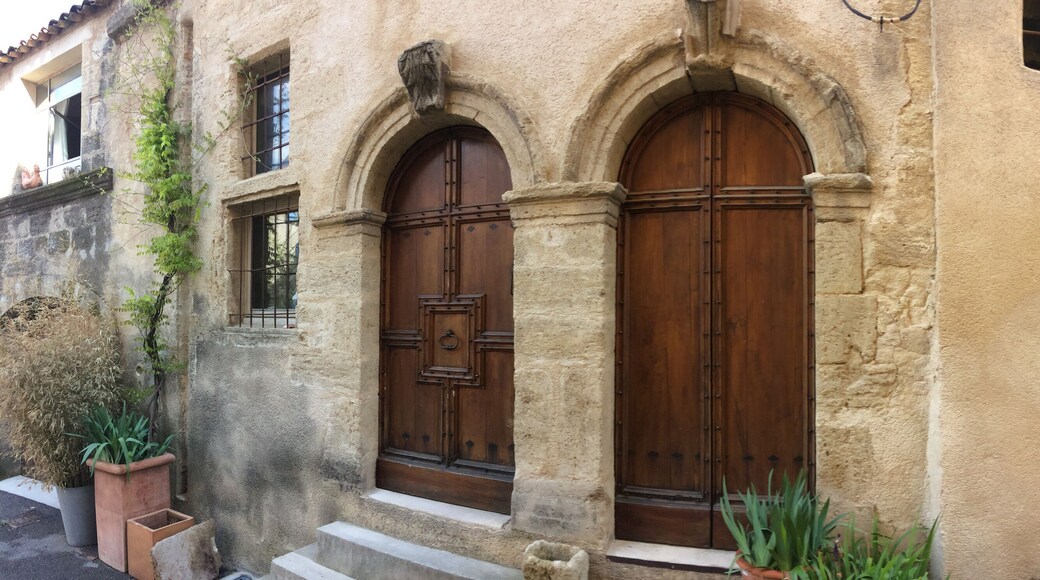 entrance of an ancient house with carved stones