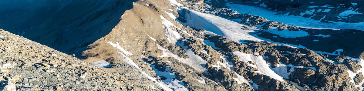 Amazing view from Rocciamelone mountain peak in Graian Alps in Italy near boders with France