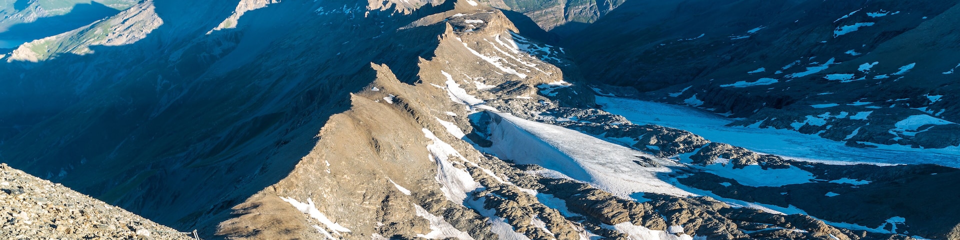 Amazing view from Rocciamelone mountain peak in Graian Alps in Italy near boders with France