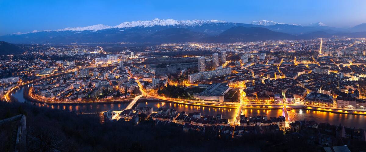Aerial panorama of Grenoble at dusk, France