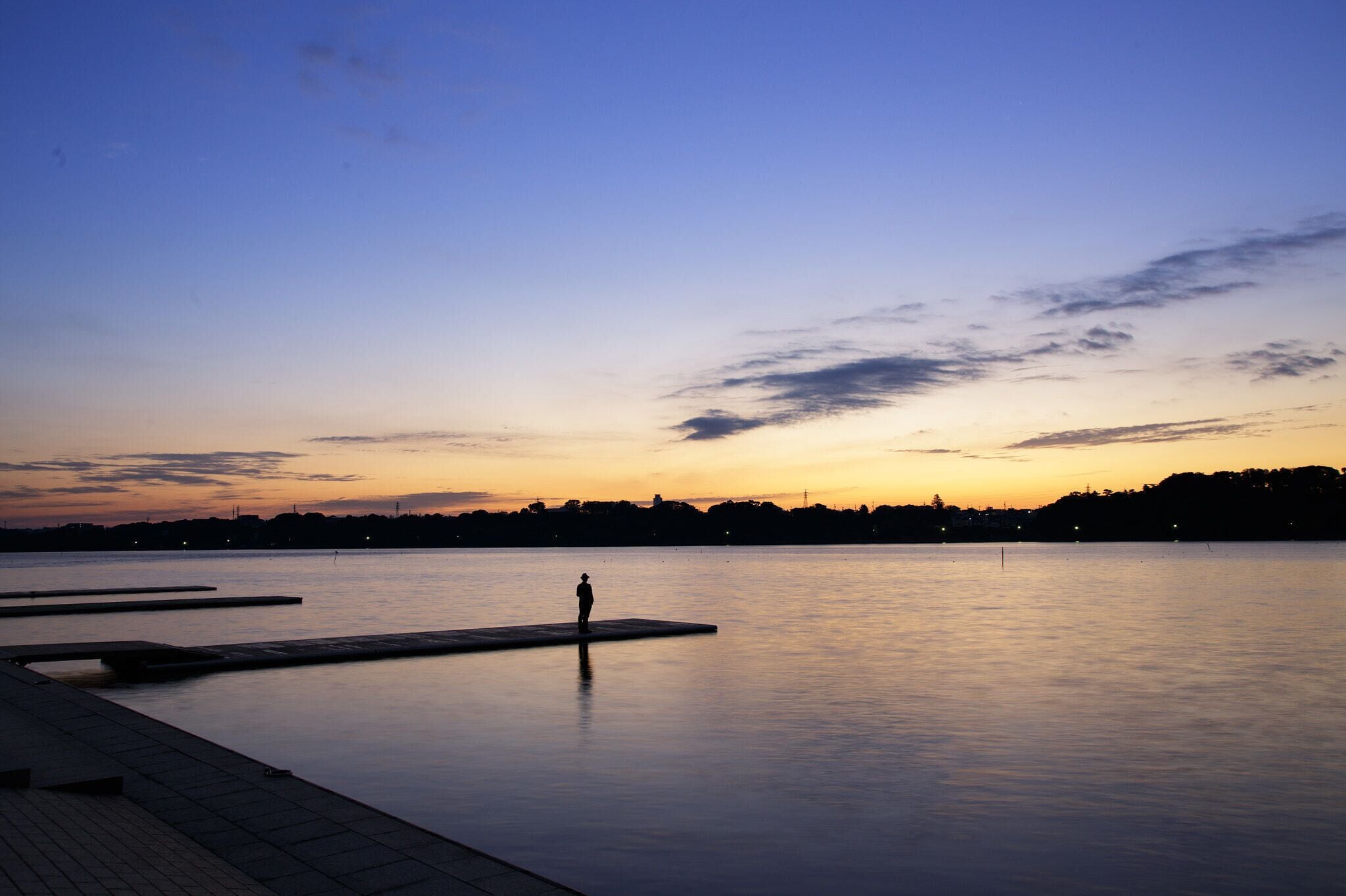 500px provided description: Lake Sanaru is a small lake located in Shizuoka Prefecture. [#sky ,#sunrise ,#morning ,#lake ,#water ,#japan ,#pier ,#morning sun ,#shizuoka ,#hamamatsu ,#chubu region ,#Hope ,#Loneliness]