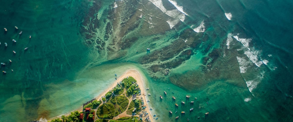 Beautiful aerial view of tropical coastline and fisherman village