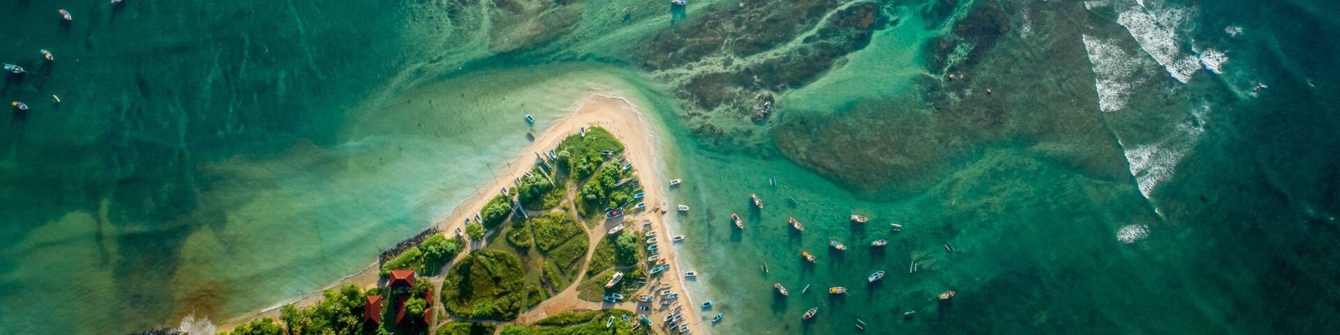Beautiful aerial view of tropical coastline and fisherman village