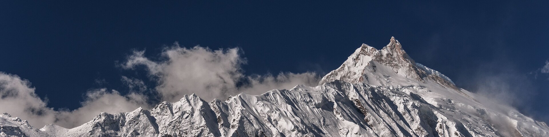 Spectacular view of Manaslu mountain as seen on Around Manaslu trail from Samagaon village to Samdo village, Manaslu Himal massif, Gorkha district, Nepal Himalayas, Nepal.