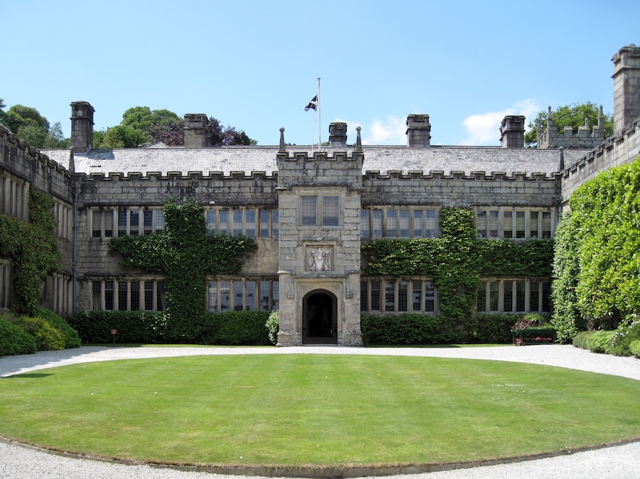 A historic building with a symmetrical facade, large windows, and a central entrance.