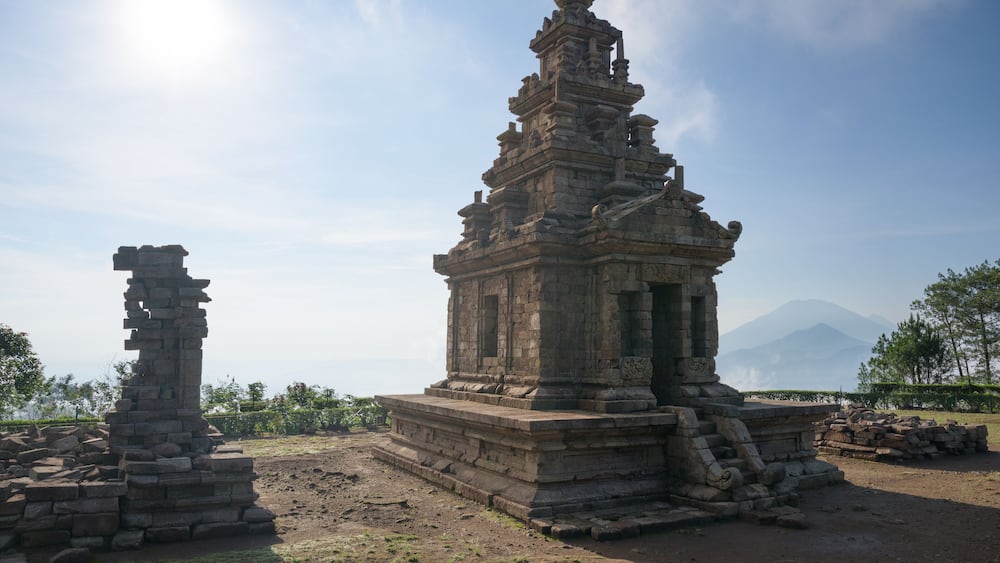 Candi Gedong Songo at sunrise. A 9th-century Buddhist temple complex on a volcano near Semarang, Java, Indonesia.