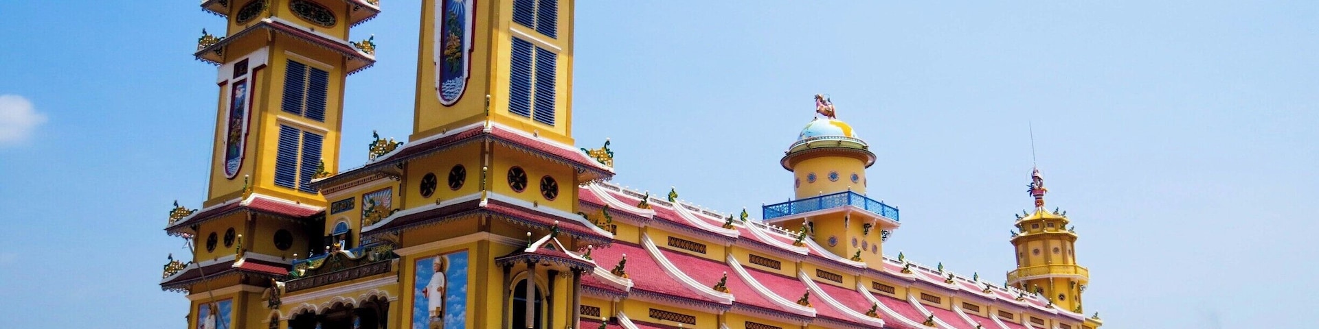 Cao Dai Temple is located in the city of Tay Ninh, about 80 Km from Ho Chi Minh City, Vietnam. Also known as Holy See, in this temple takes place a beautiful religious ceremony of the Caodaism, which is a monotheistic religion officially established in the city in 1926.