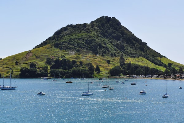 Panoramic view of Mount Maunganui in Tauranga. Tauranga is a harbourside city in the Bay of Plenty region on New Zealand's North Island.
