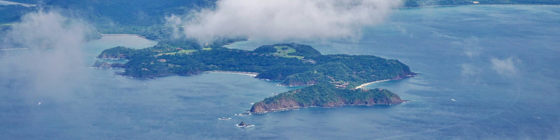 Aerial view in the clouds of rhe Golfo del Papagayo with the Peninsula Papagayo near Liberia, Costa Rica