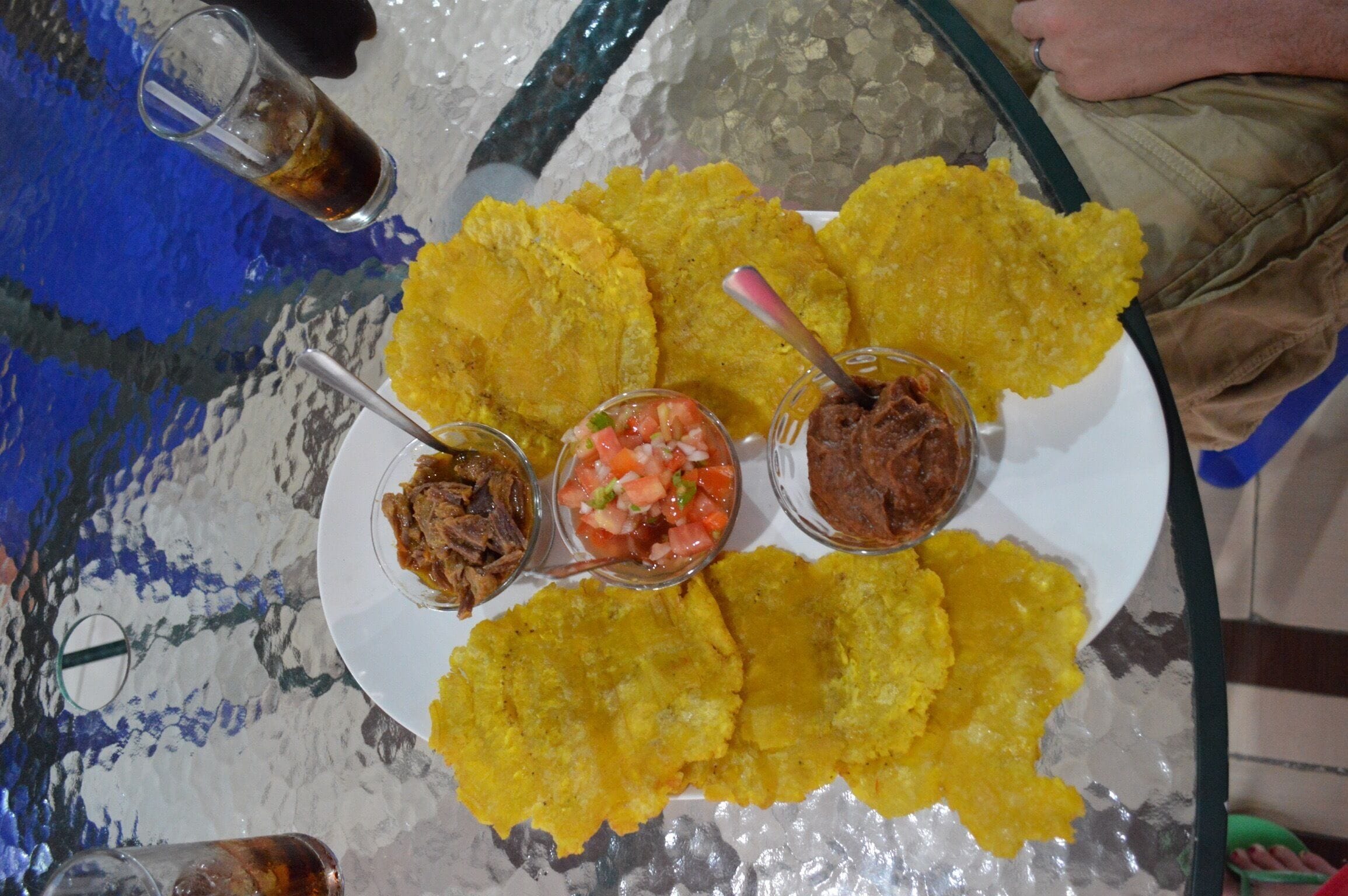 There's a place to eat at playa agujas. Order the patacones. It's fried plantains. Soooo good. 