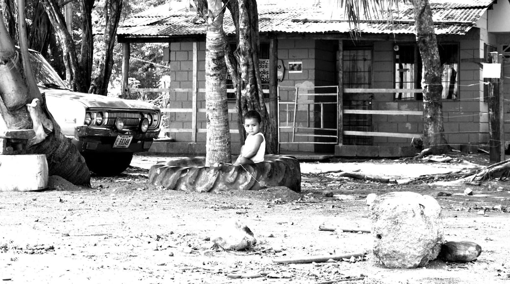 Child playing on beach.