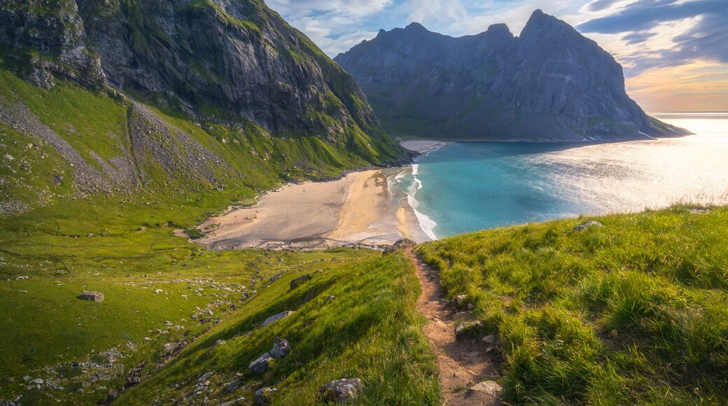 hiking mount ryten and kvalvika beach on lofoten islands in norway