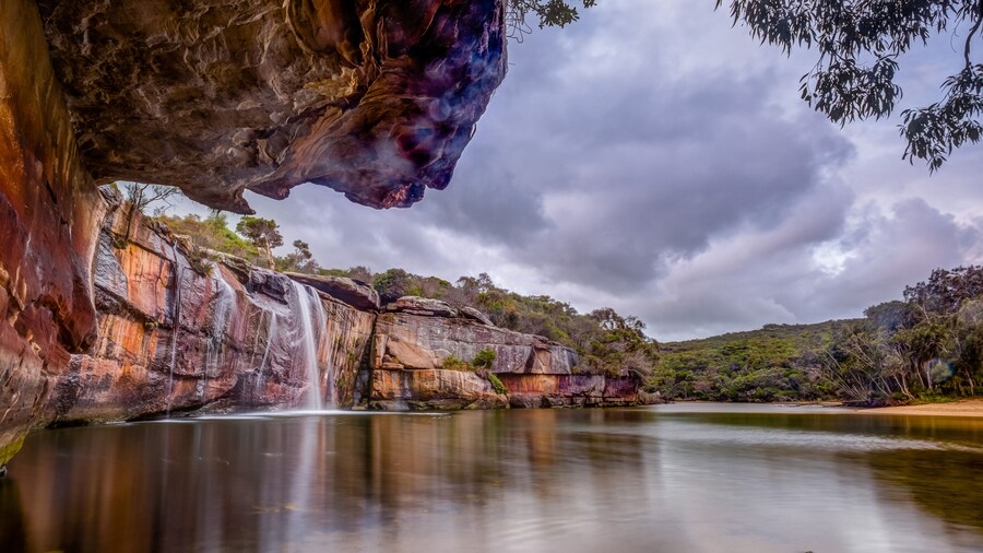 Wattamolla area located in Royal National Park including waterfalls, creek and beach