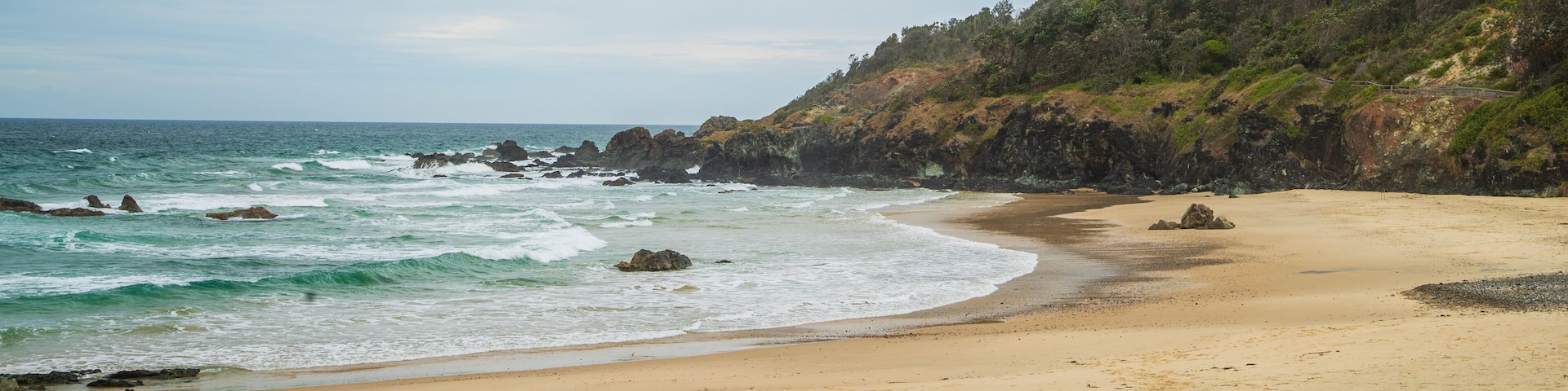 Oxley Beach which includes a beach and general coastal views