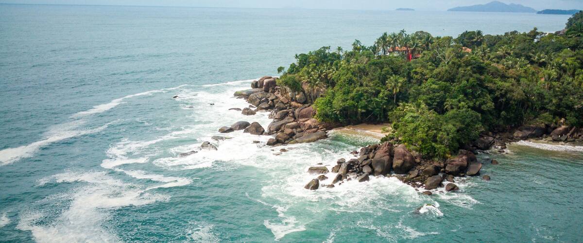 Secluded tropical beach and rocky coastline in Ubatuba, Brazil