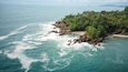 Secluded tropical beach and rocky coastline in Ubatuba, Brazil