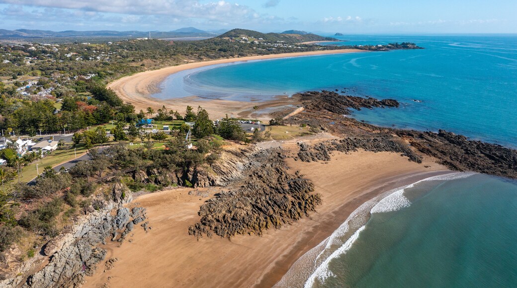 Emu Park Main Beach which includes a coastal town, general coastal views and landscape views