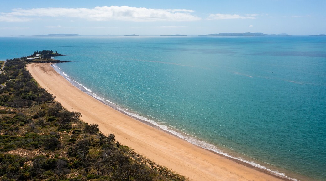 Emu Park Main Beach featuring landscape views, a sandy beach and general coastal views